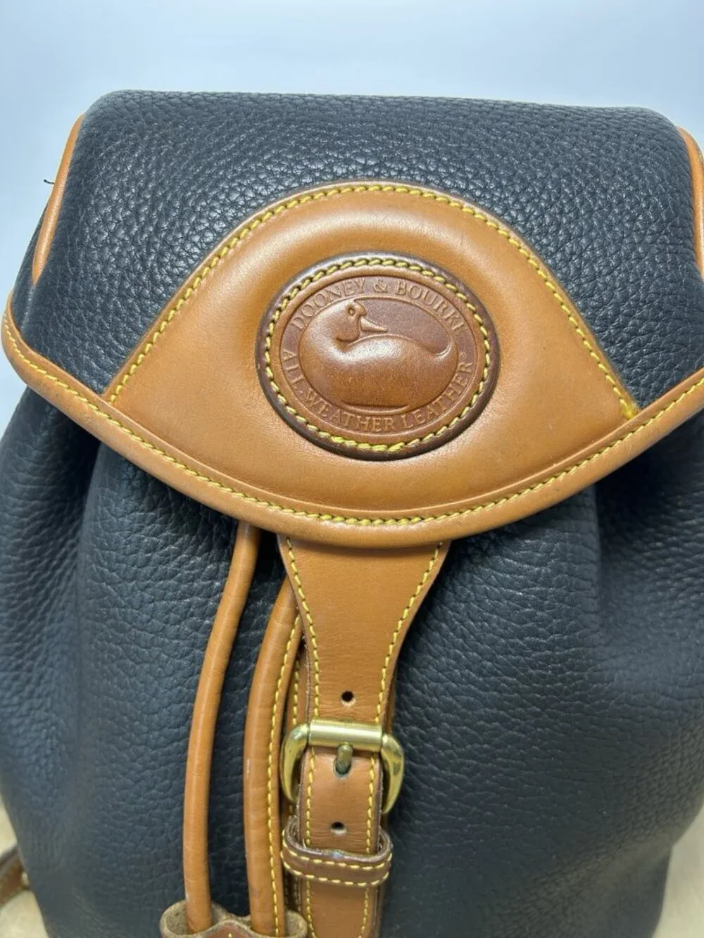 Vintage Dooney & Bourke Black Tan Color All Weather Leather Backpack